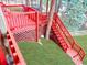View of the deck and steps leading to the grassy lawn at 29983 Hilltop Dr # 2, Evergreen, CO 80439