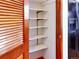 Pantry with white shelving providing ample storage, adjacent to a stainless steel refrigerator at 29983 Hilltop Dr # 2, Evergreen, CO 80439
