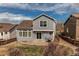 Aerial view showing a well-maintained yard and patio, perfect for enjoying outdoor living at 468 English Sparrow Trl, Highlands Ranch, CO 80129