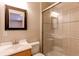 A full bathroom featuring a glass shower and neutral decor, offering a bright and clean space at 468 English Sparrow Trl, Highlands Ranch, CO 80129