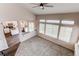 An overhead view of a living room showcasing large windows, a fireplace, and an open layout at 468 English Sparrow Trl, Highlands Ranch, CO 80129