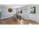 Bright dining room with a view to the outside through the patio doors at 5031 Upton Ct, Denver, CO 80239