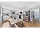 Open kitchen features stainless steel appliances and sleek modern cabinets at 5031 Upton Ct, Denver, CO 80239