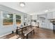 Cozy dining area with bright natural light and views to the yard at 5031 Upton Ct, Denver, CO 80239