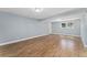 Spacious living room with wood flooring and natural light at 5031 Upton Ct, Denver, CO 80239