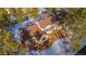 House with a large backyard and snow covered ground at 590 Cumberland Rd, Larkspur, CO 80118
