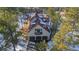 Luxury home with a three-car garage and a charming balcony at 590 Cumberland Rd, Larkspur, CO 80118