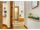 Bathroom with large soaking tub, hardwood floors, and decorative alcove at 590 Cumberland Rd, Larkspur, CO 80118