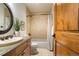 Bathroom with granite vanity and bathtub at 590 Cumberland Rd, Larkspur, CO 80118