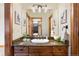 Bathroom with granite vanity and updated fixtures at 590 Cumberland Rd, Larkspur, CO 80118