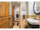 Small bathroom with single vanity and toilet at 590 Cumberland Rd, Larkspur, CO 80118