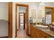 Bathroom with granite vanity and updated fixtures at 590 Cumberland Rd, Larkspur, CO 80118