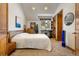 Bright bedroom with comfortable bed and plenty of closet space at 590 Cumberland Rd, Larkspur, CO 80118