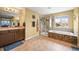 Light and bright bathroom with dual shower and bath at 5238 Gould Cir, Castle Rock, CO 80109