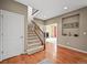 Inviting entryway with hardwood floors, a staircase, and a view into the nearby rooms at 5238 Gould Cir, Castle Rock, CO 80109