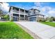 Stunning two-story home with a beautiful exterior, three-car garage, and a lush green lawn at 5238 Gould Cir, Castle Rock, CO 80109