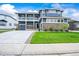 Charming two-story home with a well-maintained lawn, stone accents and a welcoming front porch at 5238 Gould Cir, Castle Rock, CO 80109