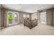 Upstairs loft area with access to balcony and plenty of natural light at 5238 Gould Cir, Castle Rock, CO 80109