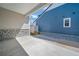 Charming covered patio with pavers, artificial turf, and an inviting outdoor area at 5150 N Quemoy Ct, Aurora, CO 80019