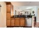 Charming kitchen with black countertops and stainless steel dishwasher at 9019 E Panorama Cir # D207, Englewood, CO 80112