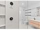 Bathroom featuring modern shower and a glimpse of the double sink vanity at 1601 Park Ave # 307, Denver, CO 80218