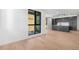 Bright living space featuring a modern kitchen with stainless steel appliances at 1601 Park Ave # 307, Denver, CO 80218
