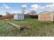 View of two storage sheds in the backyard, offering ample space for storage and organization at 9683 Josephine Pl, Thornton, CO 80229