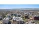 Expansive aerial view of the city with distant mountain views on a clear day, showcasing urban landscape at 891 14Th St # 3415, Denver, CO 80202