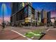 Street-level view of a building at an intersection with bicycle crossing in downtown Denver at 891 14Th St # 3415, Denver, CO 80202
