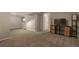 Basement featuring carpet flooring and neutral decor at 11894 Elk Head Range Rd, Littleton, CO 80127