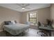 Cozy bedroom with a window, desk, and comfortable furnishings for relaxation and productivity at 11894 Elk Head Range Rd, Littleton, CO 80127
