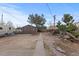 View of backyard and detached garage with ample space at 3912 S Acoma St, Englewood, CO 80110