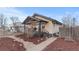 Charming home with a covered front porch and landscaped yard at 3912 S Acoma St, Englewood, CO 80110