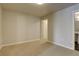 A bright, carpeted bedroom featuring neutral walls and trim for a calming and inviting space at 410 Acoma St # 212, Denver, CO 80204