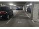 Indoor parking garage with clearly marked parking spaces and ample room at 410 Acoma St # 212, Denver, CO 80204