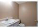 Cozy bathroom with a single vanity and toilet at 19421 E Milan Cir, Aurora, CO 80013