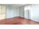The bedroom is freshly painted with modern hard wood floors at 19421 E Milan Cir, Aurora, CO 80013