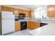 Kitchen featuring stainless appliances, and plenty of counter space at 19421 E Milan Cir, Aurora, CO 80013