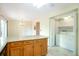 Eat in kitchen with laminate floors and stainless washer dryer at 19421 E Milan Cir, Aurora, CO 80013