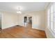 Bright dining room with hardwood floors and multiple windows at 265 S Pennsylvania St, Denver, CO 80209