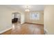 Bright dining room with hardwood floors and multiple windows at 265 S Pennsylvania St, Denver, CO 80209