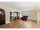 Bright living room with hardwood floors, fireplace and large windows at 265 S Pennsylvania St, Denver, CO 80209