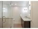 Sleek bathroom with glass-enclosed shower and granite countertops at 67 Indigo Way, Castle Rock, CO 80108