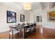 Modern dining room with stylish decor and ample seating for entertaining guests at 67 Indigo Way, Castle Rock, CO 80108