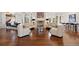 Bright and airy living room with a fireplace, hardwood floors, and elegant decor at 67 Indigo Way, Castle Rock, CO 80108