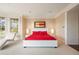 Well-lit main bedroom with a large window providing natural light and a view of the outdoors at 67 Indigo Way, Castle Rock, CO 80108