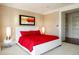Bright main bedroom featuring a large picture window, neutral walls, and carpeted floors at 67 Indigo Way, Castle Rock, CO 80108