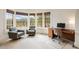 Bright office space with large windows providing natural light and scenic views of the outdoors at 67 Indigo Way, Castle Rock, CO 80108