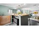Entertainment space with a bar including a mini refrigerator, creating a perfect spot for hosting friends and Gathering at 5740 S Cherokee St, Littleton, CO 80120