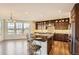 Spacious kitchen with a large island, granite countertops, stainless steel appliances, and custom cabinets at 15705 Red Deer Dr, Morrison, CO 80465